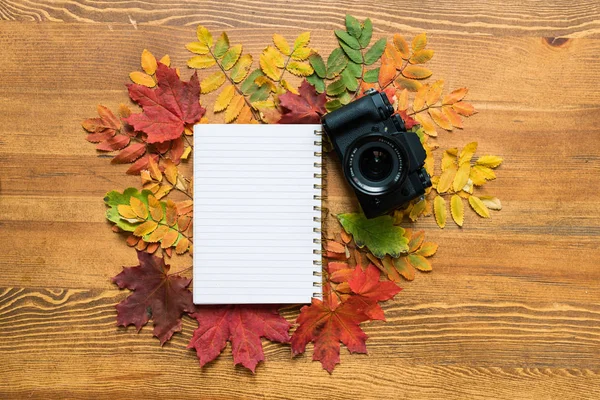 Wooden Table Blank Sheet Copybook Surrounded Colorful Autumn Leaves Photocamera — Stock Photo, Image