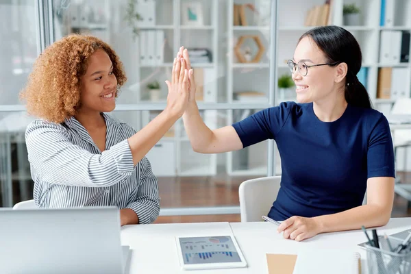 Happy Young Successful Coleges Giving High Five Each Other Desk — Stok Foto