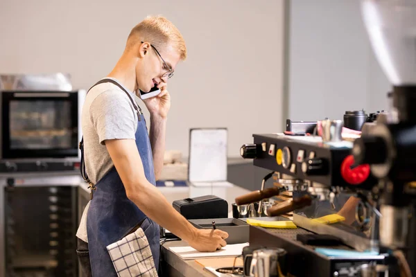 Young Waiter Worker Cafeteria Writing Orders Clients Notepad While Talking — Stock Photo, Image