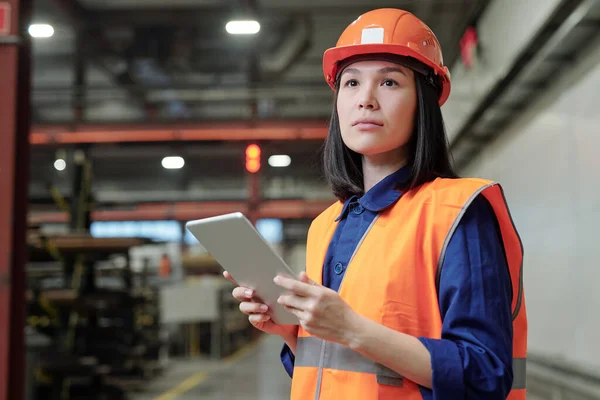 Pensive Asian Female Process Engineer Work Helmet Safety Vest Using — Stock Photo, Image