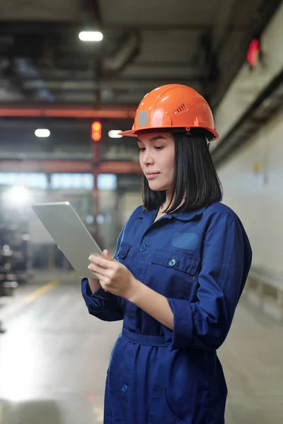 Serious Young Asian Female Engineer Overall Analyzing Industrial Processes Tablet — Stock Photo, Image