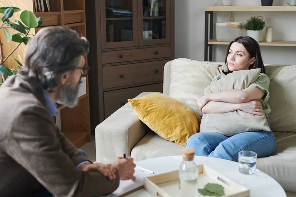 Young Upset Female Pillow Sitting Couch Looking Window While Telling — Stock Photo, Image