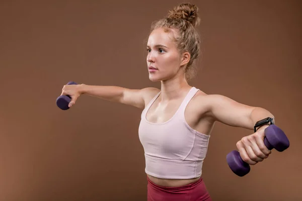 Pretty Blond Sportswoman Activewear Keeping Her Arms Outstretched Physical Exercise — Stock Photo, Image