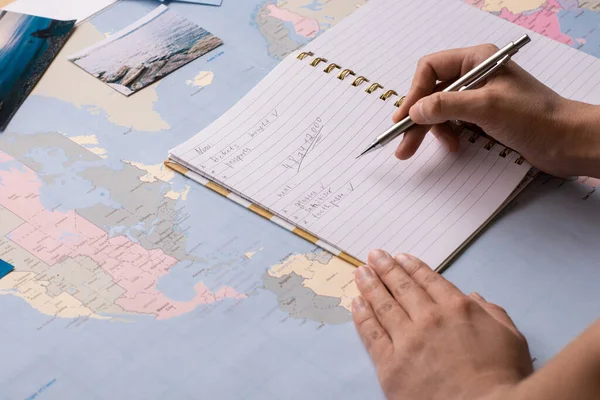 Close Unrecognizable Woman Checking List Notepad While Preparing Trip — Stock Photo, Image