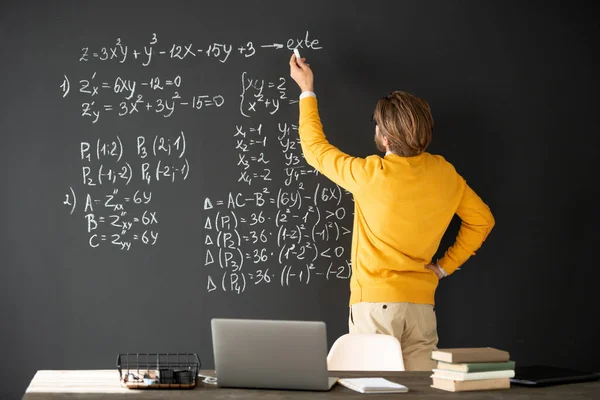 Rear View Contemporary Teacher Casualwear Writing Formulas Blackboard Explaining Them Stock Photo