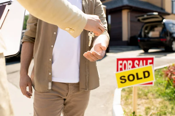 Close Unrecognizable Realtor Giving House Key New Owner Signing Contract — Stock Photo, Image