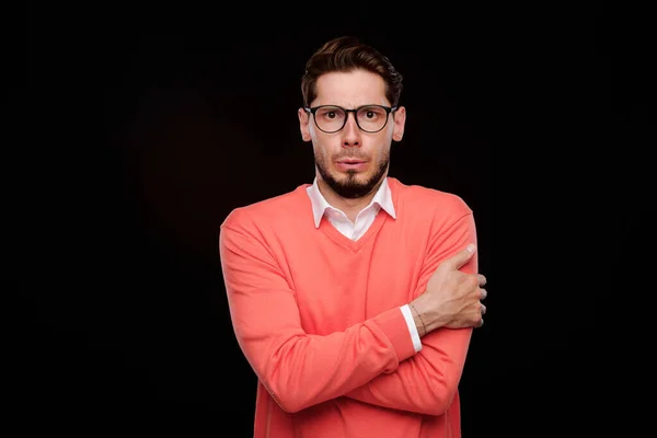 Young Man Stubble Hugging Himself While Shivering Cold Black Isolated — Stock Photo, Image