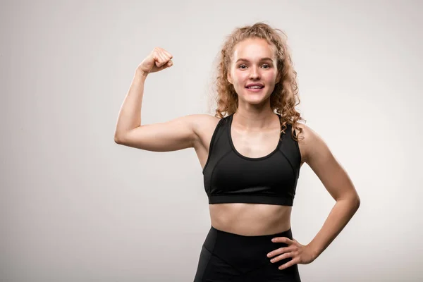 Strong Young Woman Black Tracksuit Keeping Arm Bent Elbow While — Stock Photo, Image