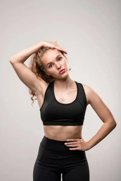 Fit Young Woman Black Tracksuit Touching Her Long Blond Curly — Stock Photo, Image