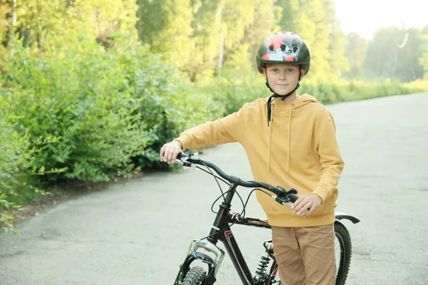 Youthful Boy Yellow Hoodie Beige Pants Protective Helmet Standing Bicycle — Stock Photo, Image