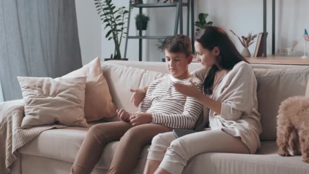 Medium Shot Young Woman Sitting Couch Living Room Talking Her — Stock Video