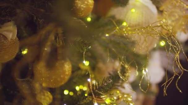 Closeup Mas Decorations Christmas Tree Glowing Lights Burning Red Firewood — Stock Video
