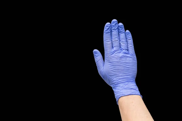 Hand Van Een Blanke Man Een Blauwe Handschoen Geïsoleerd Een — Stockfoto