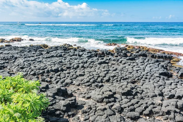 Lava rocks along Spouting Horn coast, Kauai, Hawaii