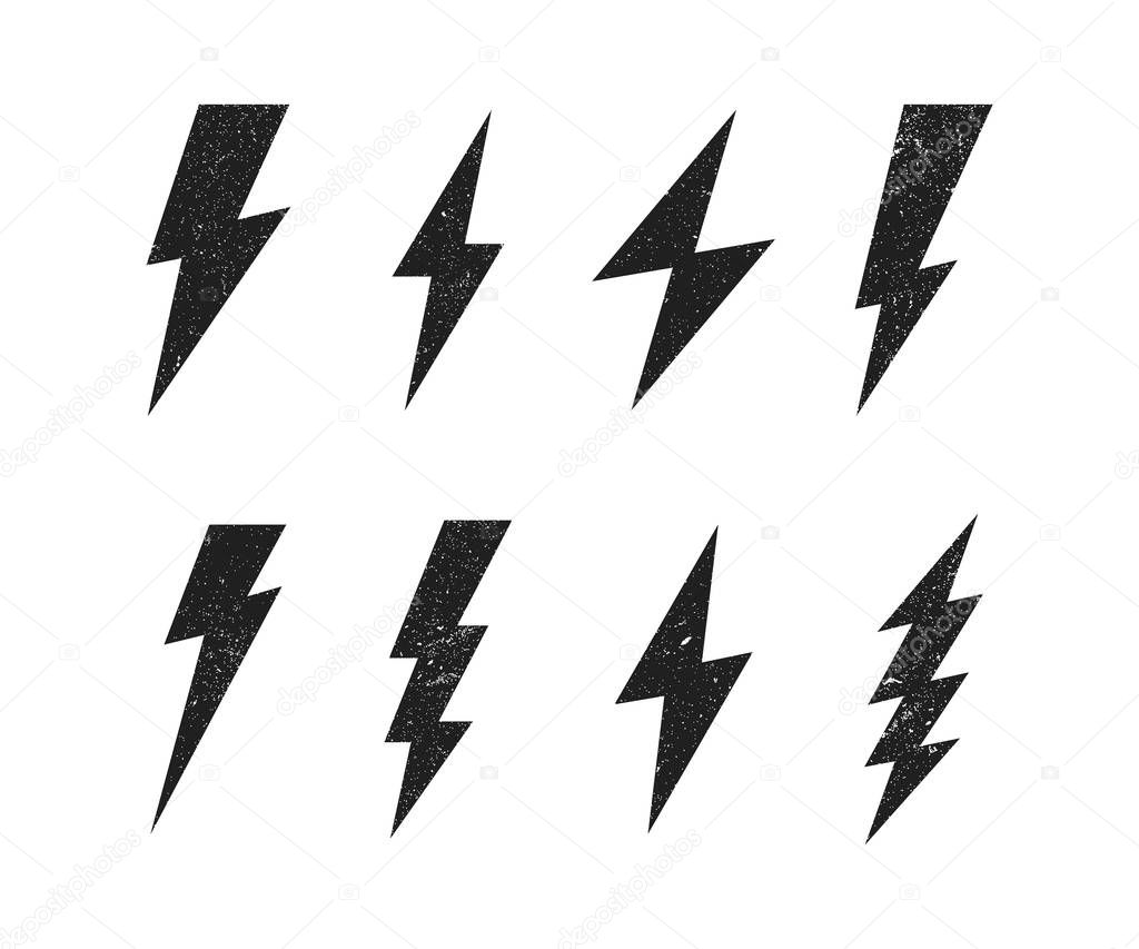 Set Lightning bolt with grunge texture. Thunderbolt, lightning strike. Modern flat style vector illustration