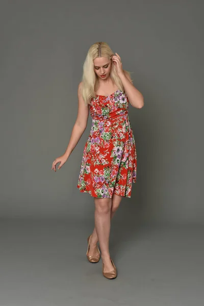 Full Length Portrait Blonde Girl Wearing Red Floral Dress Standing — Stock Photo, Image