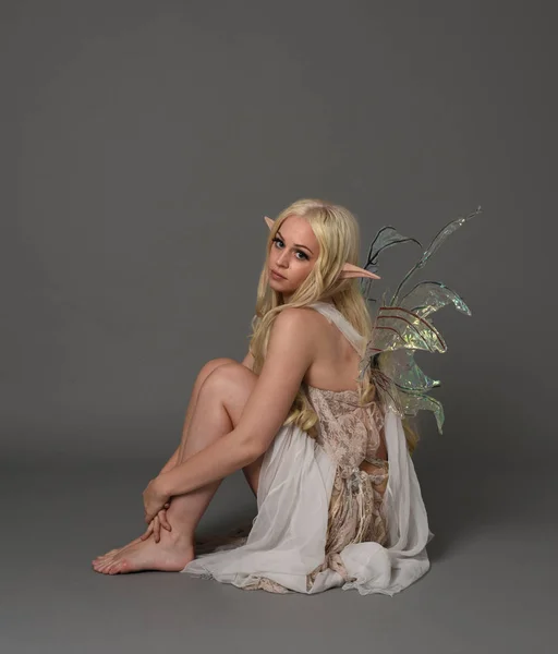 Full Length Portrait Blonde Girl Wearing Fantasy Fairy Costume Seated — Stock Photo, Image