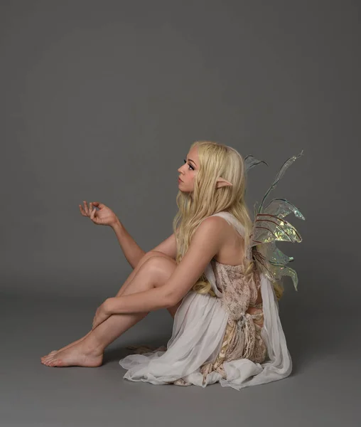 Full Length Portrait Blonde Girl Wearing Fantasy Fairy Costume Seated — Stock Photo, Image