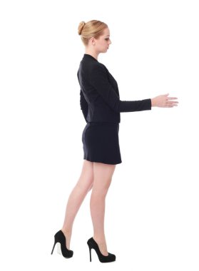 Tam boy siyah elbise giyen bir çekici profesyonel kadın portresi. beyaz bir arka plan üzerinde izole.