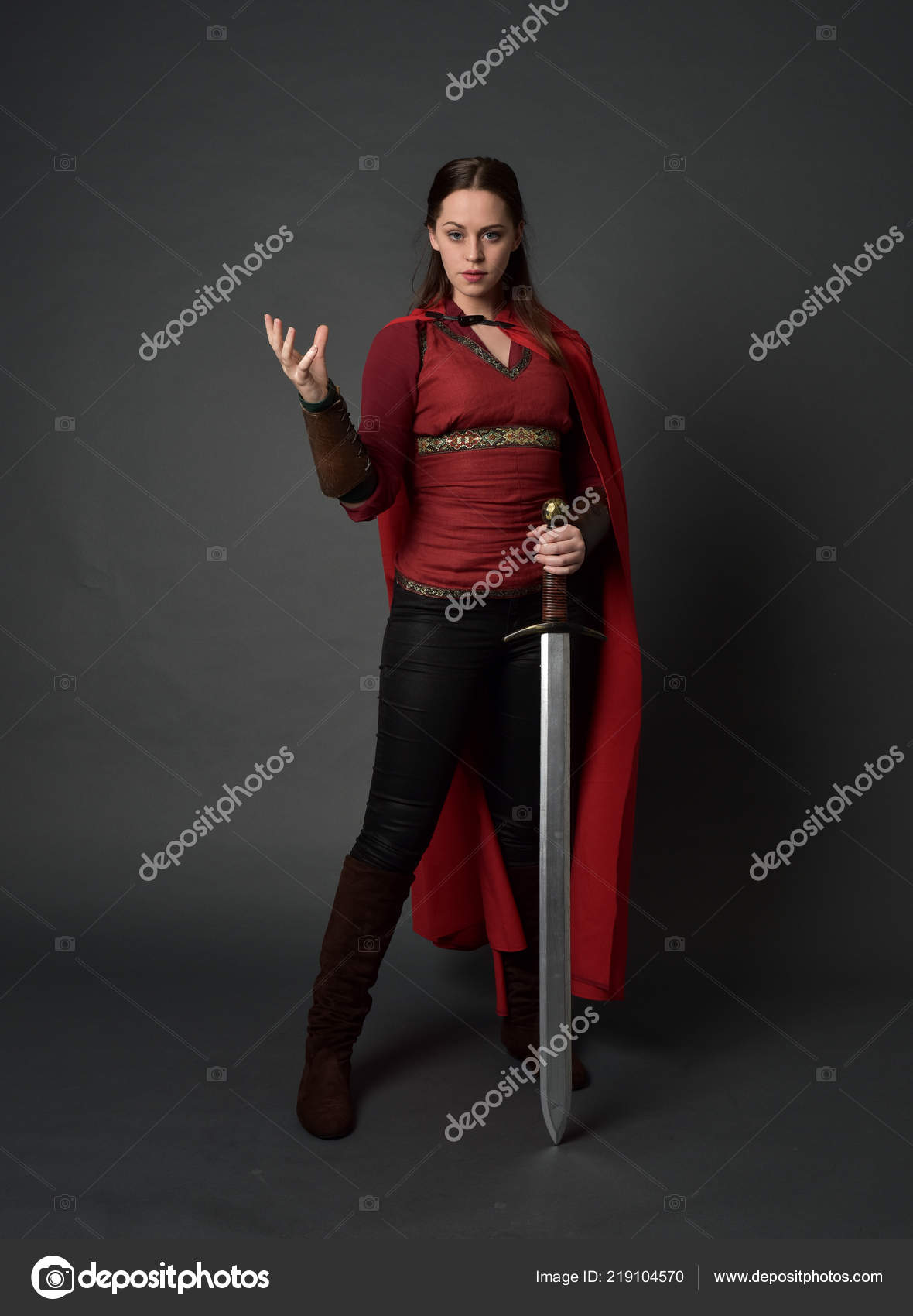 Full length portrait of girl wearing medieval costume. standing • wall  stickers brown, pretty, figure | myloview.com