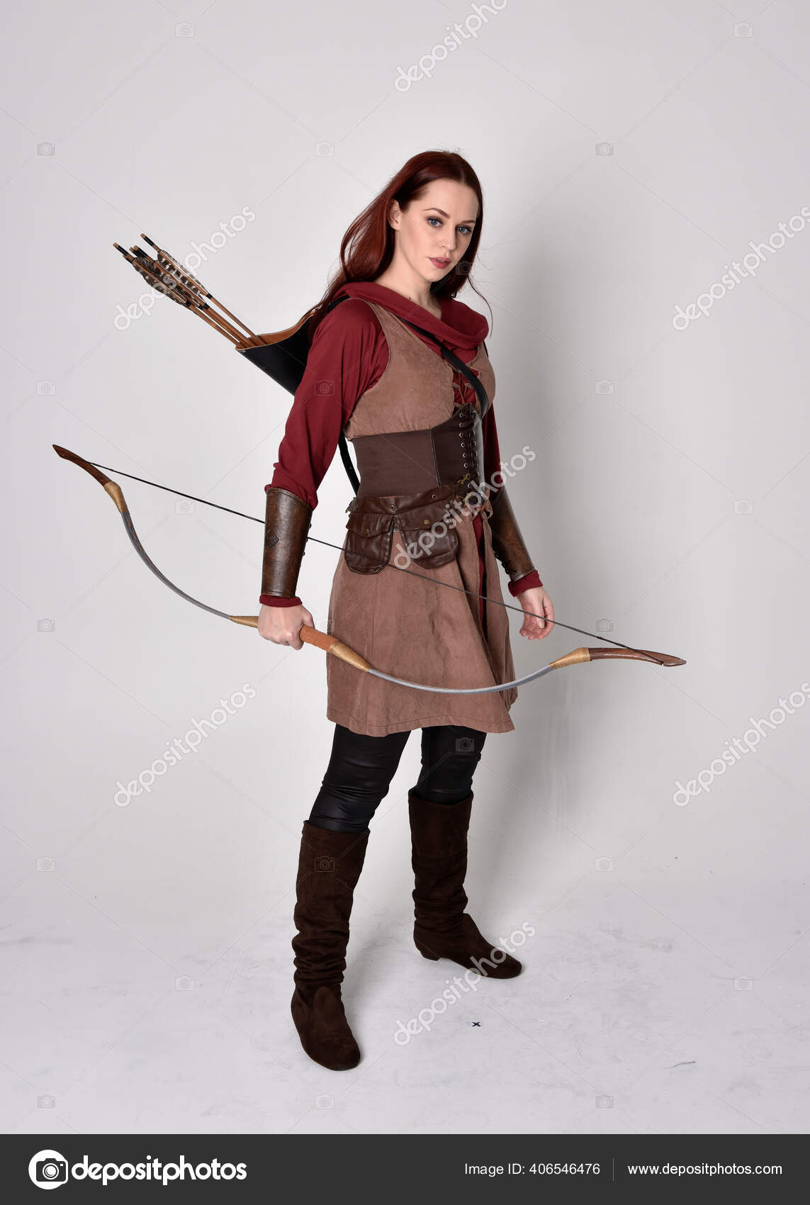 Full Length Portrait Girl Red Hair Wearing Brown Medieval Archer Stock  Photo by ©faestock 406546476