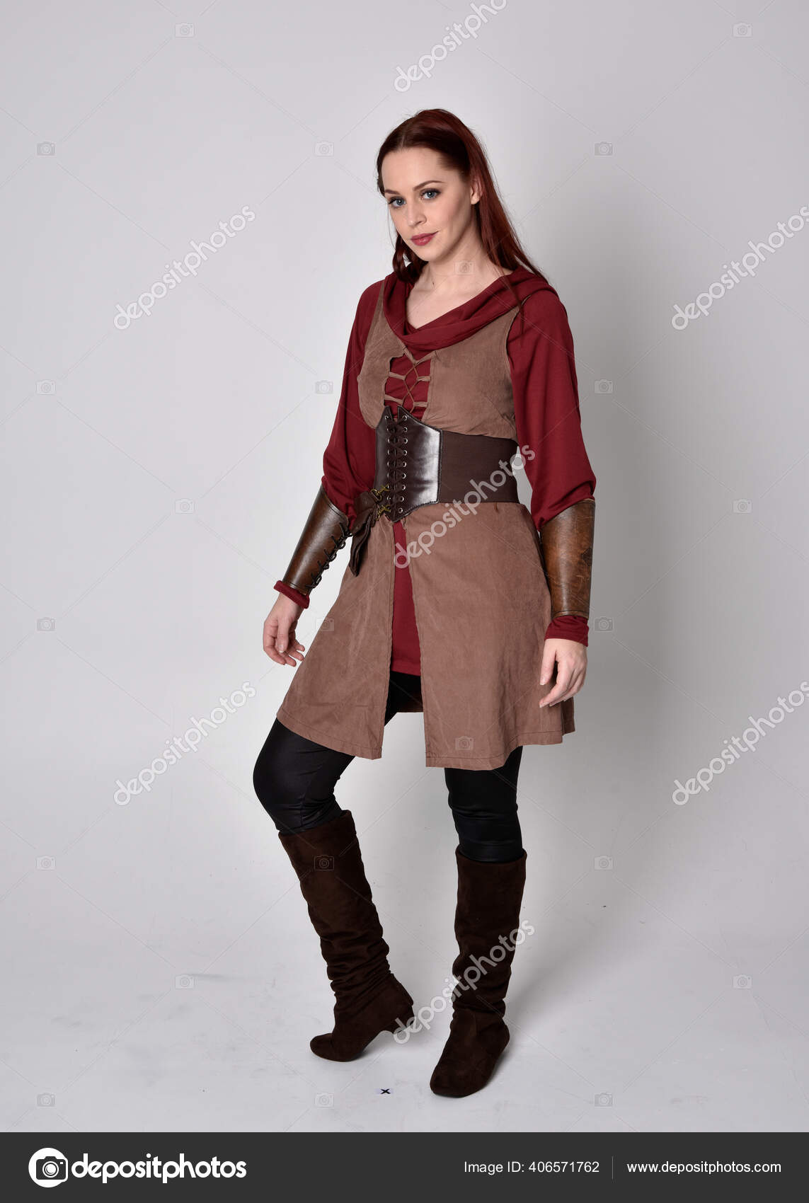 full length portrait of girl wearing medieval costume with sword. standing  pose with back to the camera, isolated on white studio background. Stock  Photo | Adobe Stock