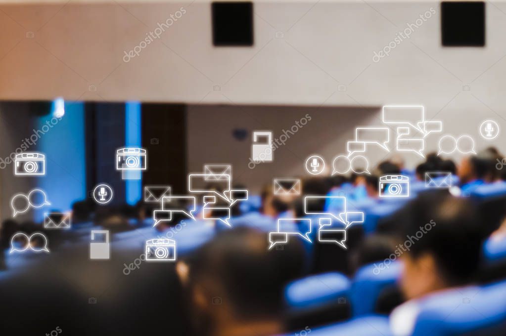 Rear view of audience attending meeting business seminar in conference room  With Social Icons