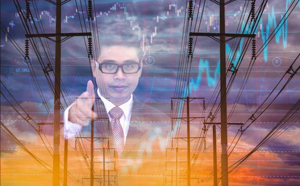 Double exposure Businessman with leadership,electric pole, and sky stock graph background,concept of volatility stocks and energy businesses in global market.