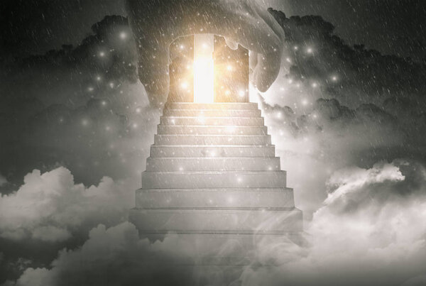 The hand of God and stairway to travel to the gates of heaven an
