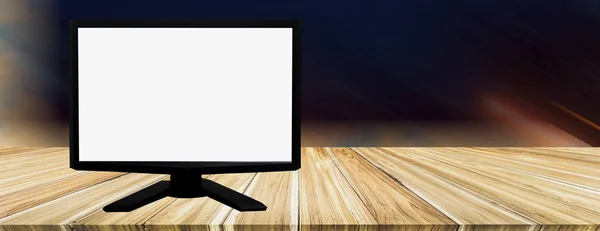 Weißer Bildschirm Computer auf Holztisch platziert, verschwommener Hintergrund — Stockfoto