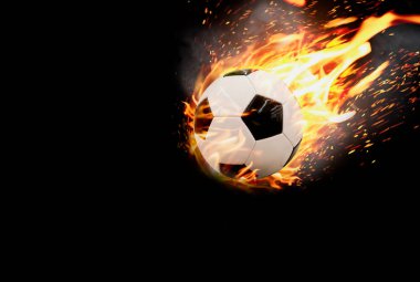 Futbol önümüzde alevli bir ateş ve dumanla uçuyor.