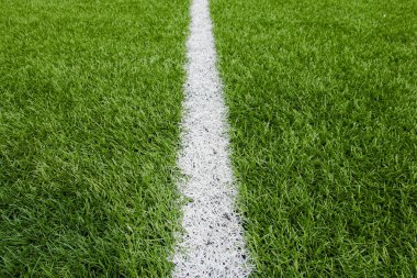Yeşil futbol arka plan dikey bir çizgi ile.
