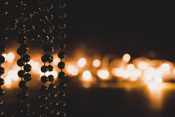 Decorative Beads Background Glowing Garland Low Key — Stock Photo, Image