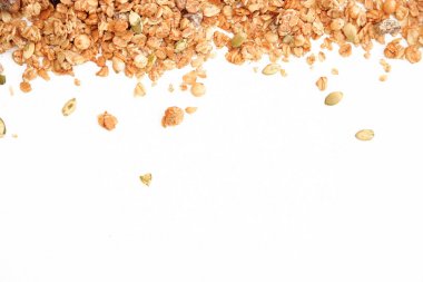Gevrek müsli kuru Kahvaltı beyaz arka plan seçici odak izole, üst görünümü