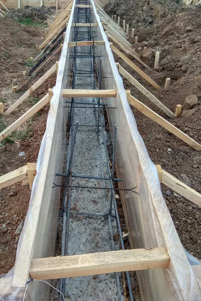 Wooden formwork concrete strip foundation for a cottage 2018 — Stock Image Wooden Formwork Concrete Strip Foundation Cottage 2018 Royalty Free Stock Images