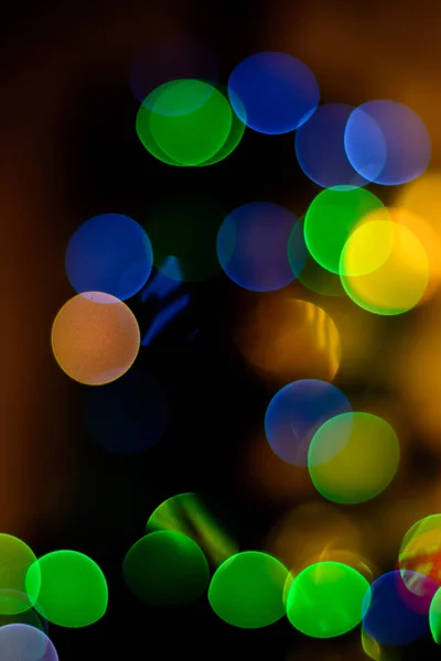 Bokeh Blue Green Yellow Red Tones Black Background New Year — Stock Photo, Image