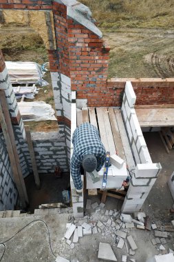 Bir mala kullanarak asıl gasblocks inşaat alanında 2018 yapış yapış bir çözümle tutkallar