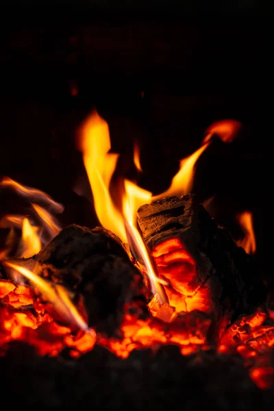 Fire is red in a closed oven on black background. — Stock Photo, Image