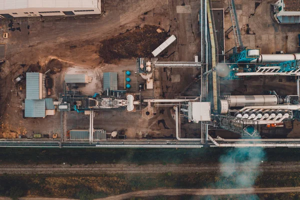 Smoke ejection from a woodworking pipe, top view. — Stock Photo, Image