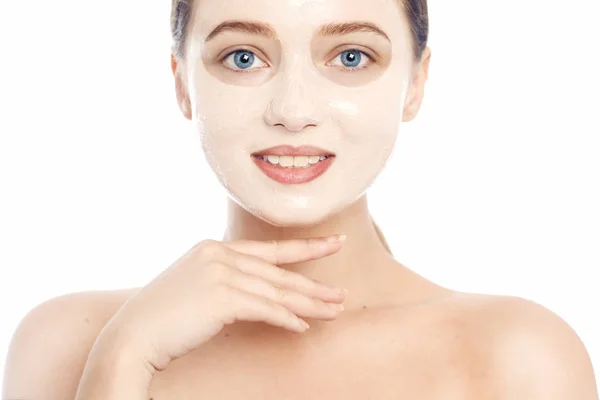 Brunette in a white mask for the face. Beautiful photo of a girl — Stock Photo, Image