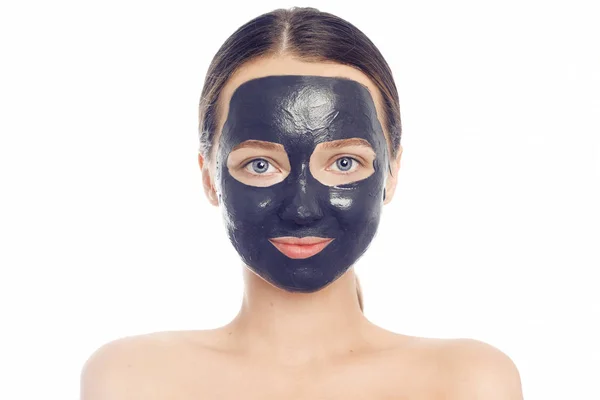 Brunette in a black mask for the face. Beautiful photo of a girl — Stock Photo, Image