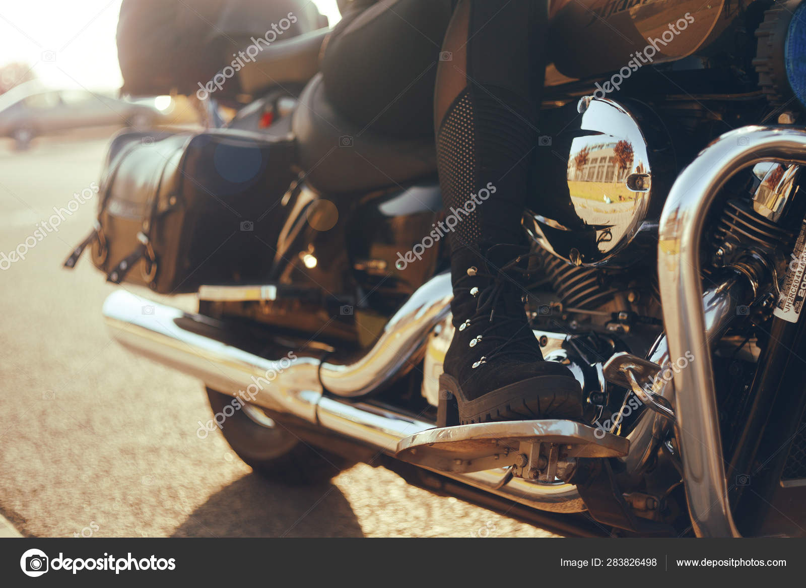 Biker girl riding on a Bottom view of the legs in le