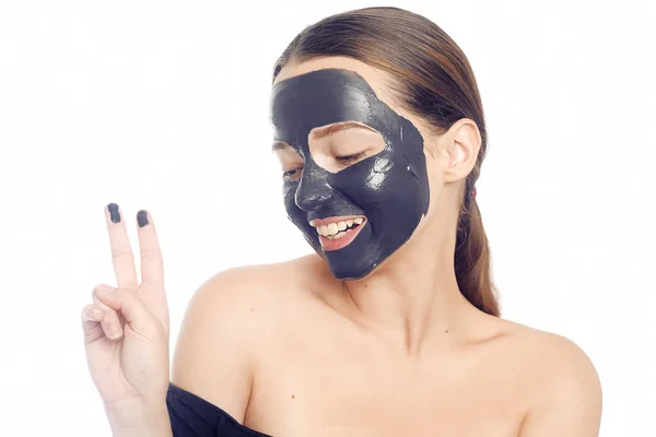 Brunette in black mask for the face. Beautiful girl with perfect — Stock Photo, Image