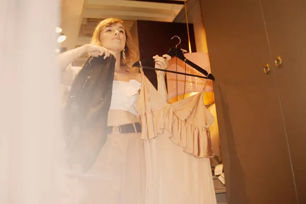 Woman Looks Mirror Chooses Dresses Girl Going Date What Better — Stock Photo, Image