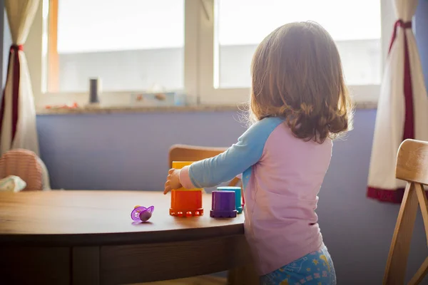 Toddler playing in pajamas Royalty Free Stock Images