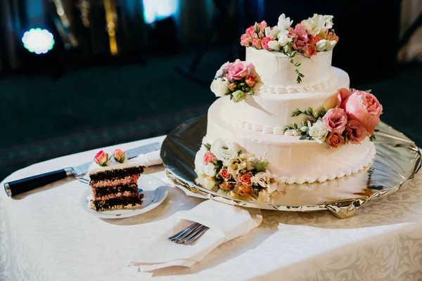 beautiful wedding cake with flowers, close up