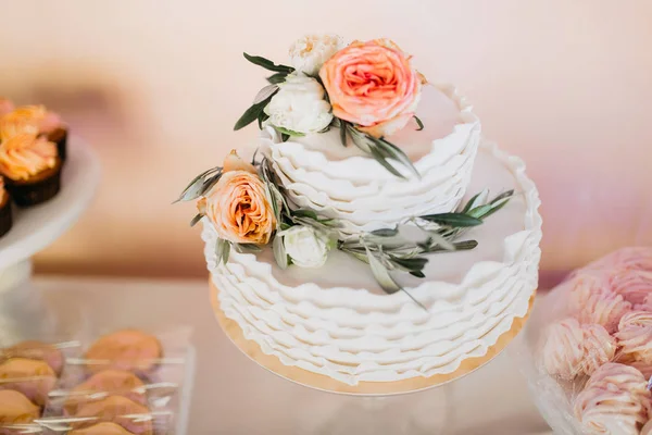 beautiful wedding cake with flowers, close up
