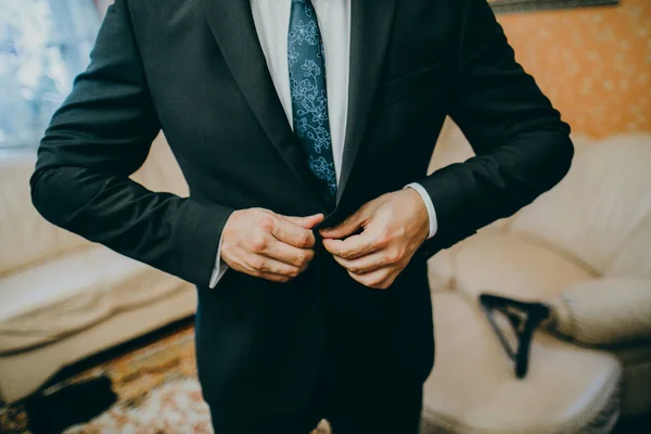 young   man wearing jacket indoors