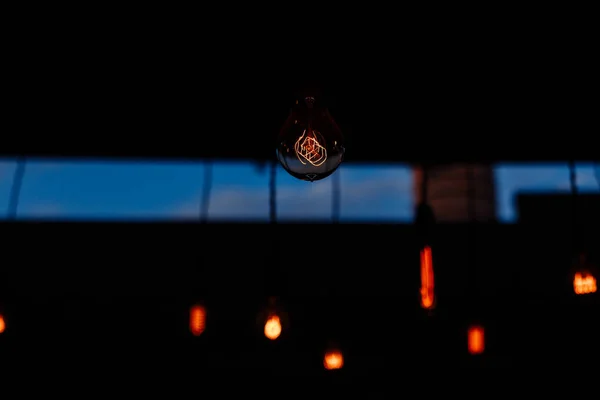 Close Shot Incandescent Light Bulb Dark Blurred Background — Stock Photo, Image