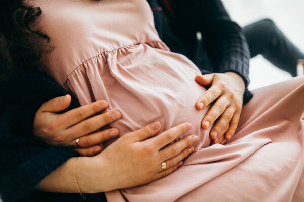 married couple posing at home